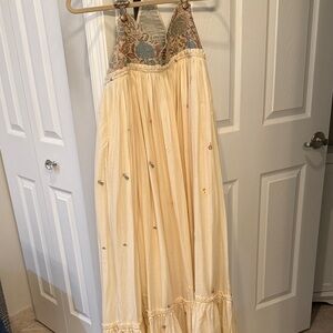 Bohemian Cream Maxi Dress with embroidered overalls bib.